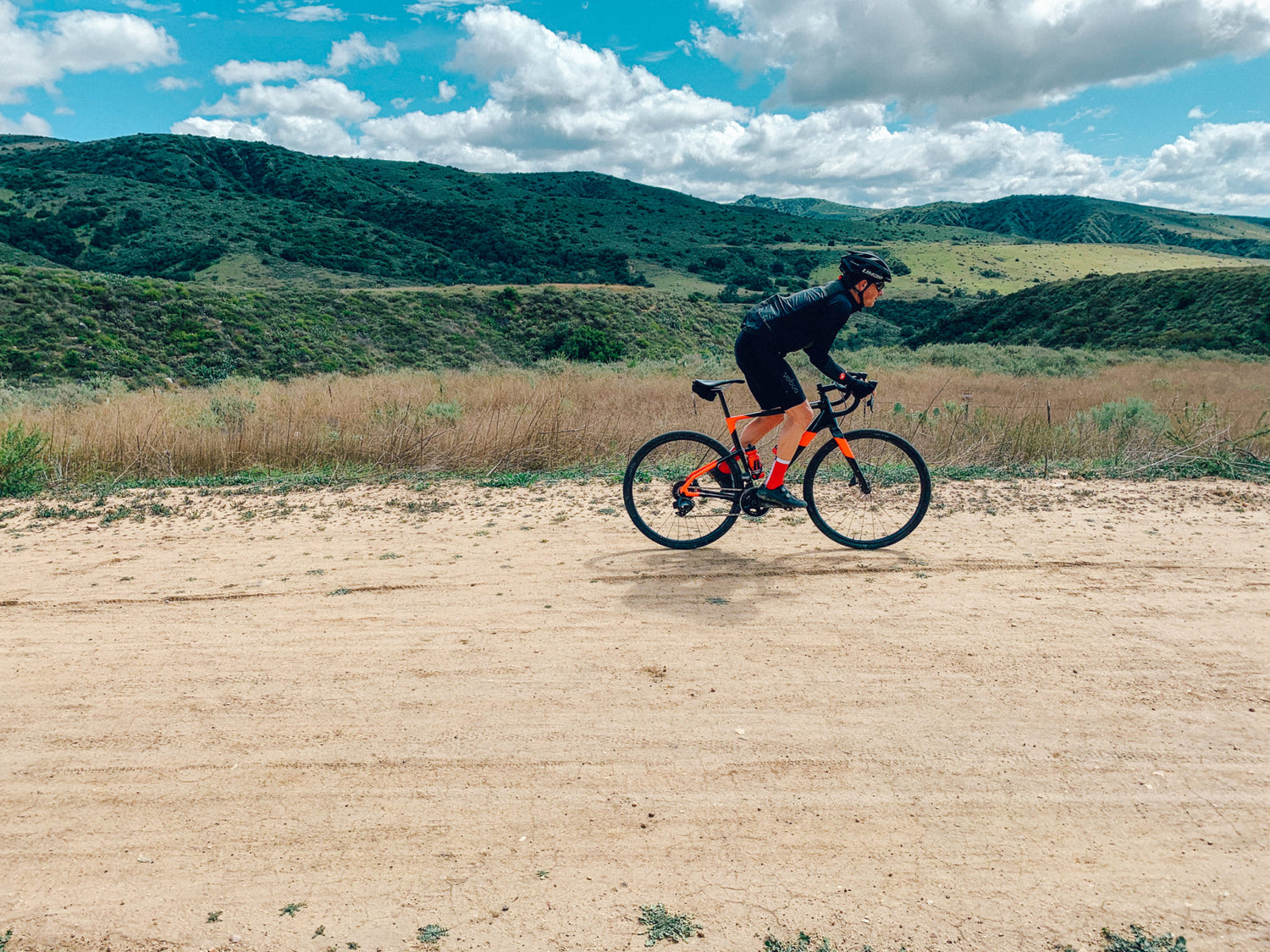 cyclist rides a gravel trail through o'neil park